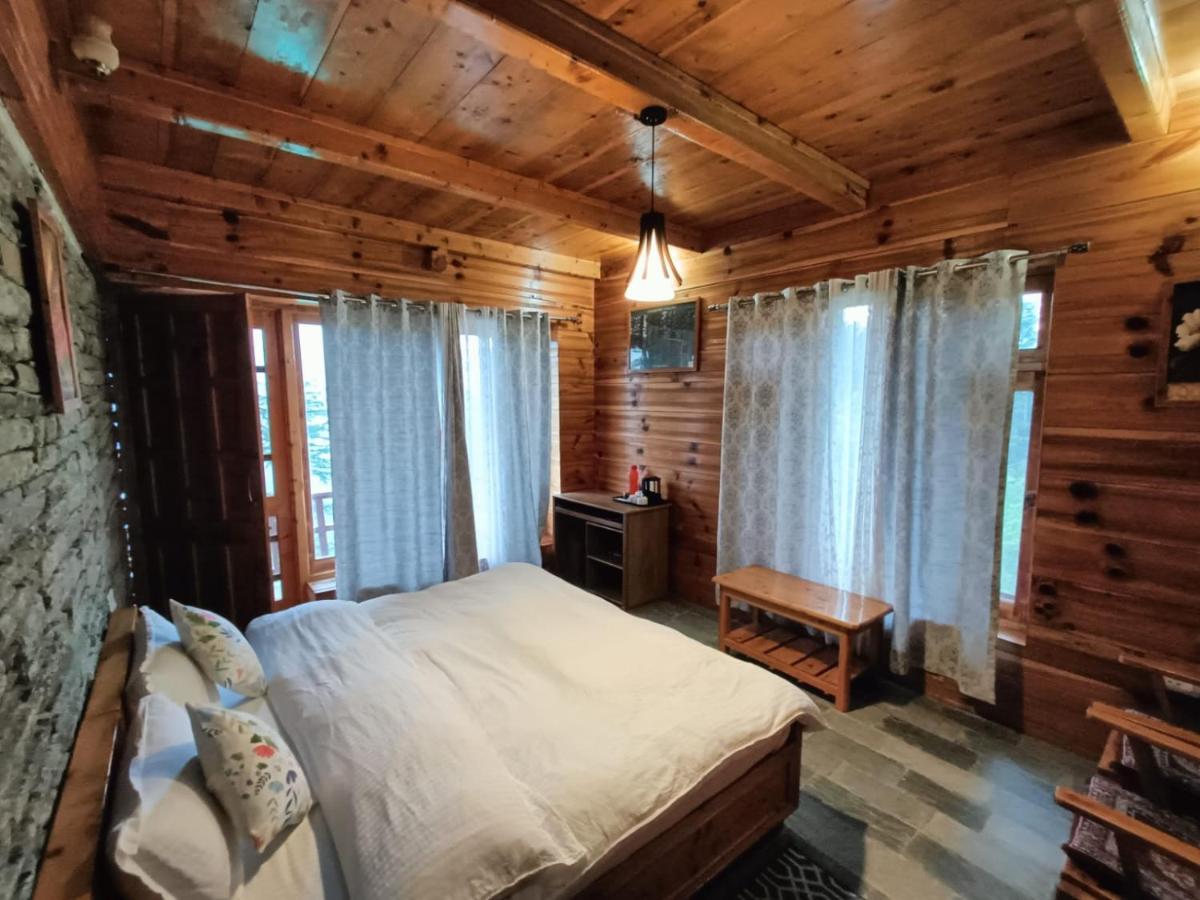 Ishan Log Huts-A Boutique Home Stay Banjar Bagian luar foto