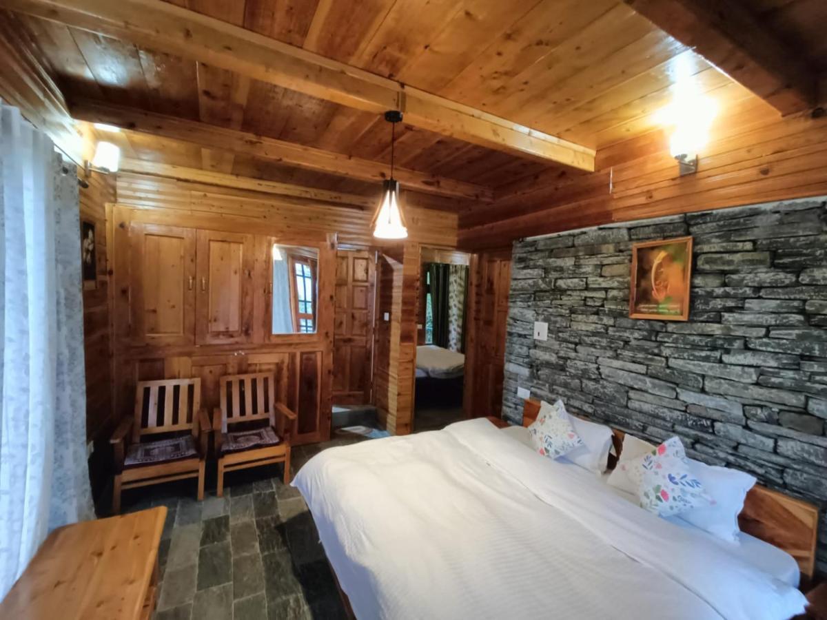 Ishan Log Huts-A Boutique Home Stay Banjar Bagian luar foto