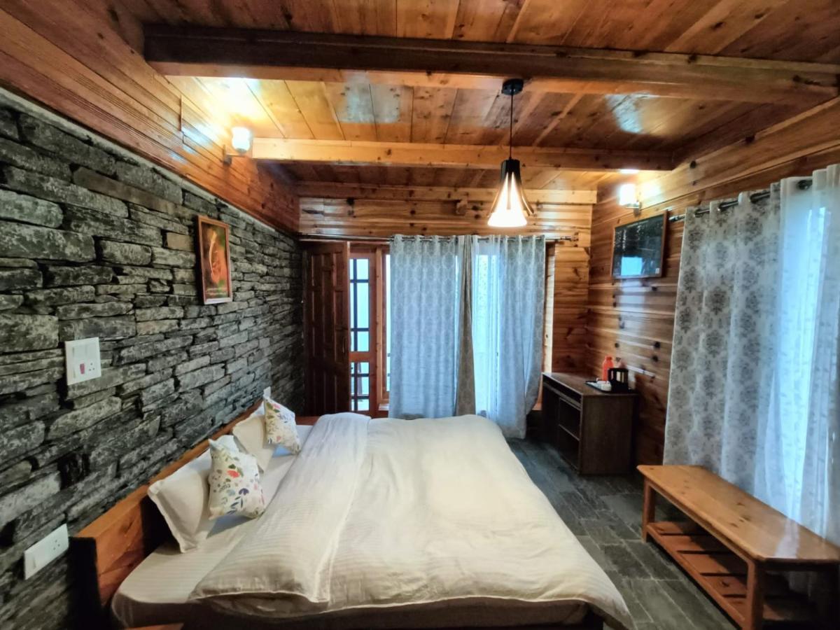 Ishan Log Huts-A Boutique Home Stay Banjar Bagian luar foto
