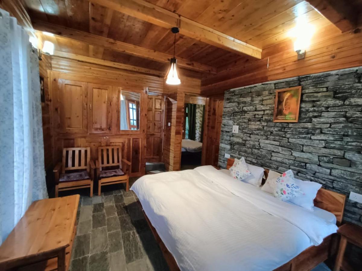 Ishan Log Huts-A Boutique Home Stay Banjar Bagian luar foto