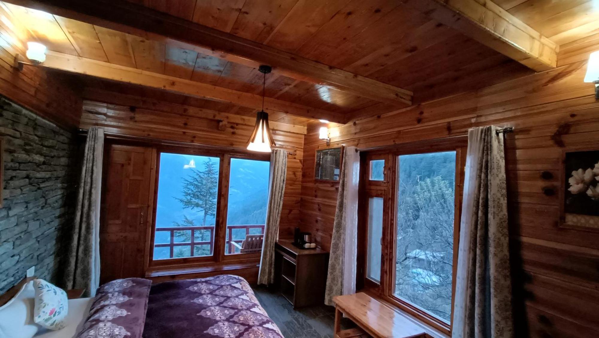 Ishan Log Huts-A Boutique Home Stay Banjar Bagian luar foto