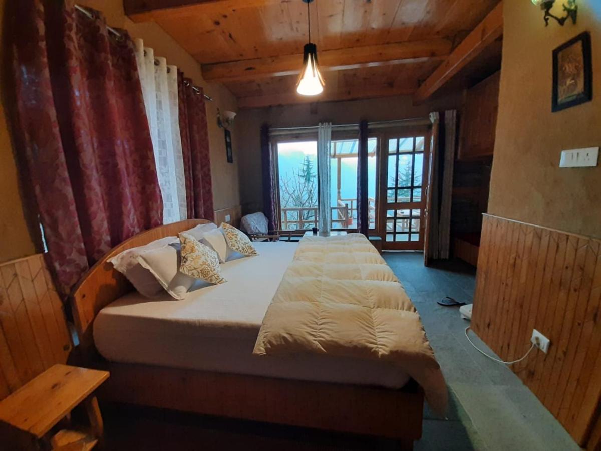 Ishan Log Huts-A Boutique Home Stay Banjar Bagian luar foto